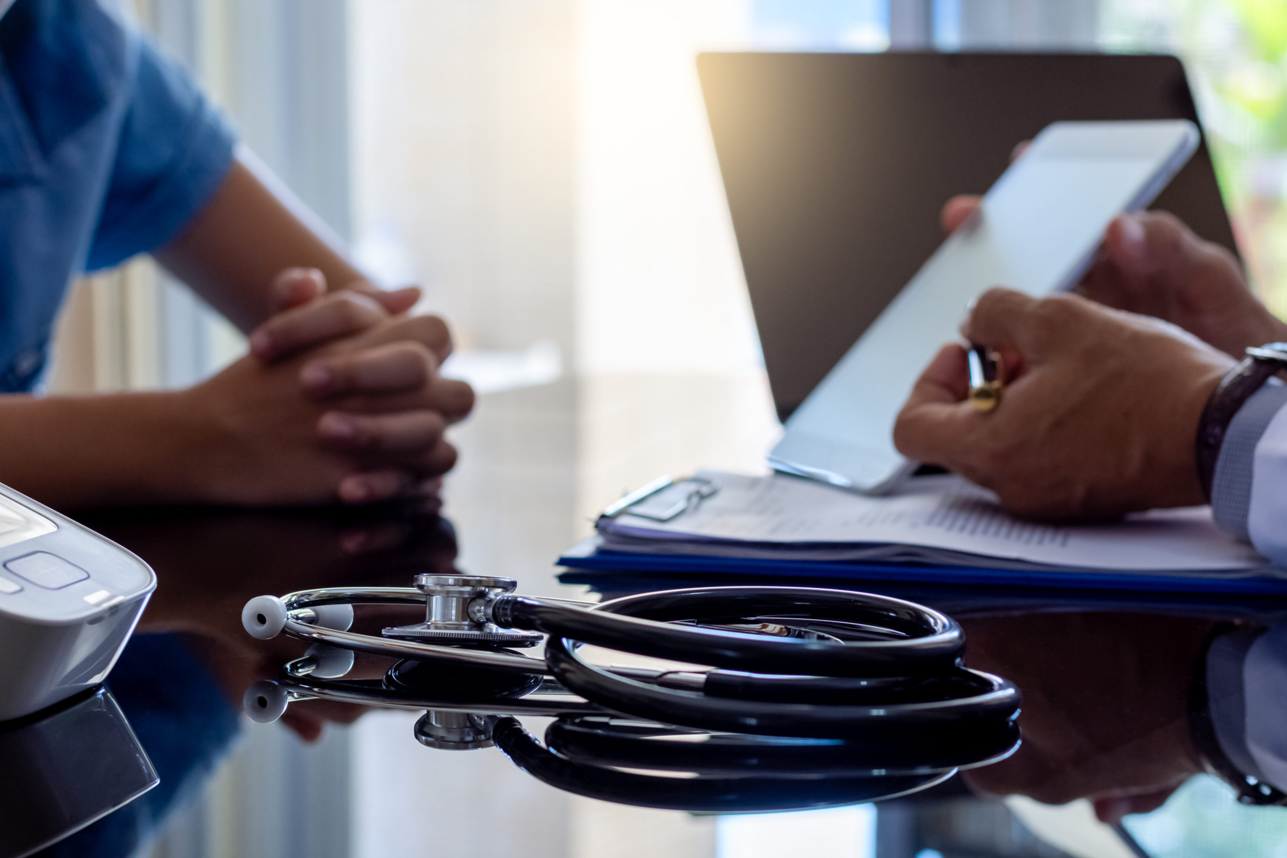 Doctor showing patient their returned data